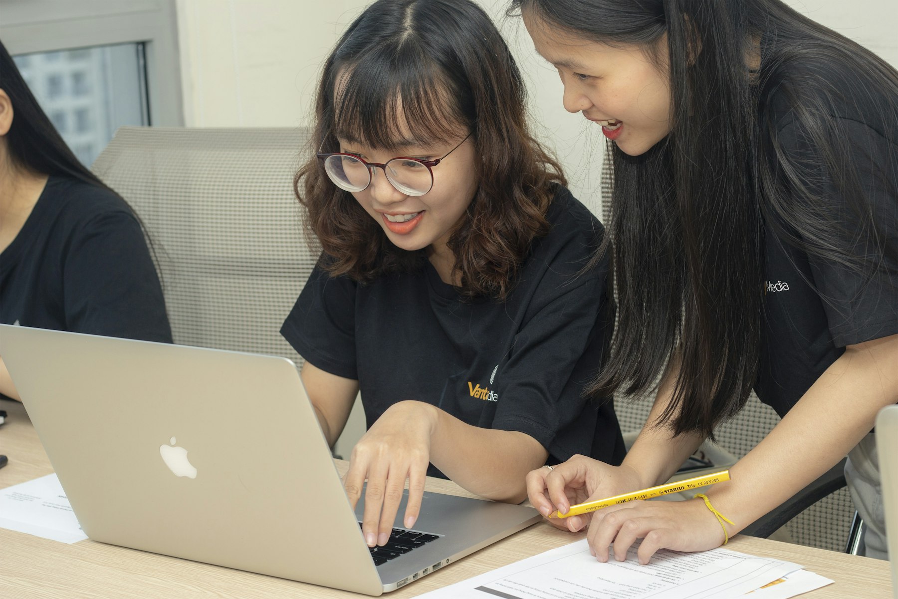 Students working together on a laptop